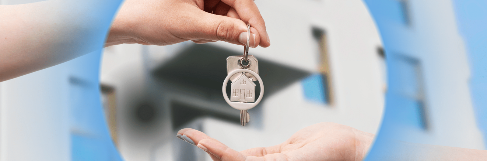 two hands receiving key