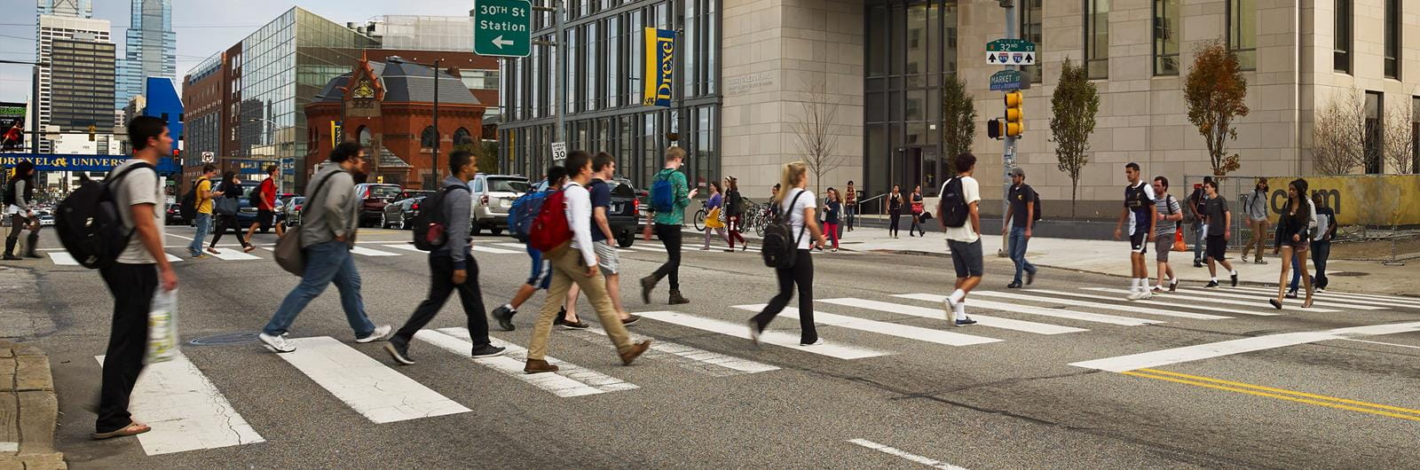 Students crossing street on Drexel campus