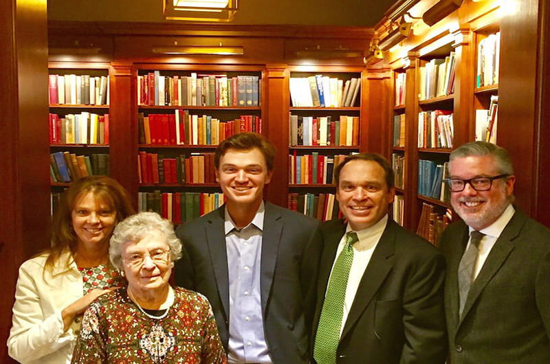 Chris Crawford with President John Fry and his family.