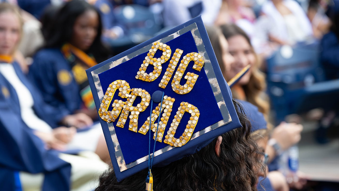 A bedazzled commencement cap with "Big Grad" written on it.