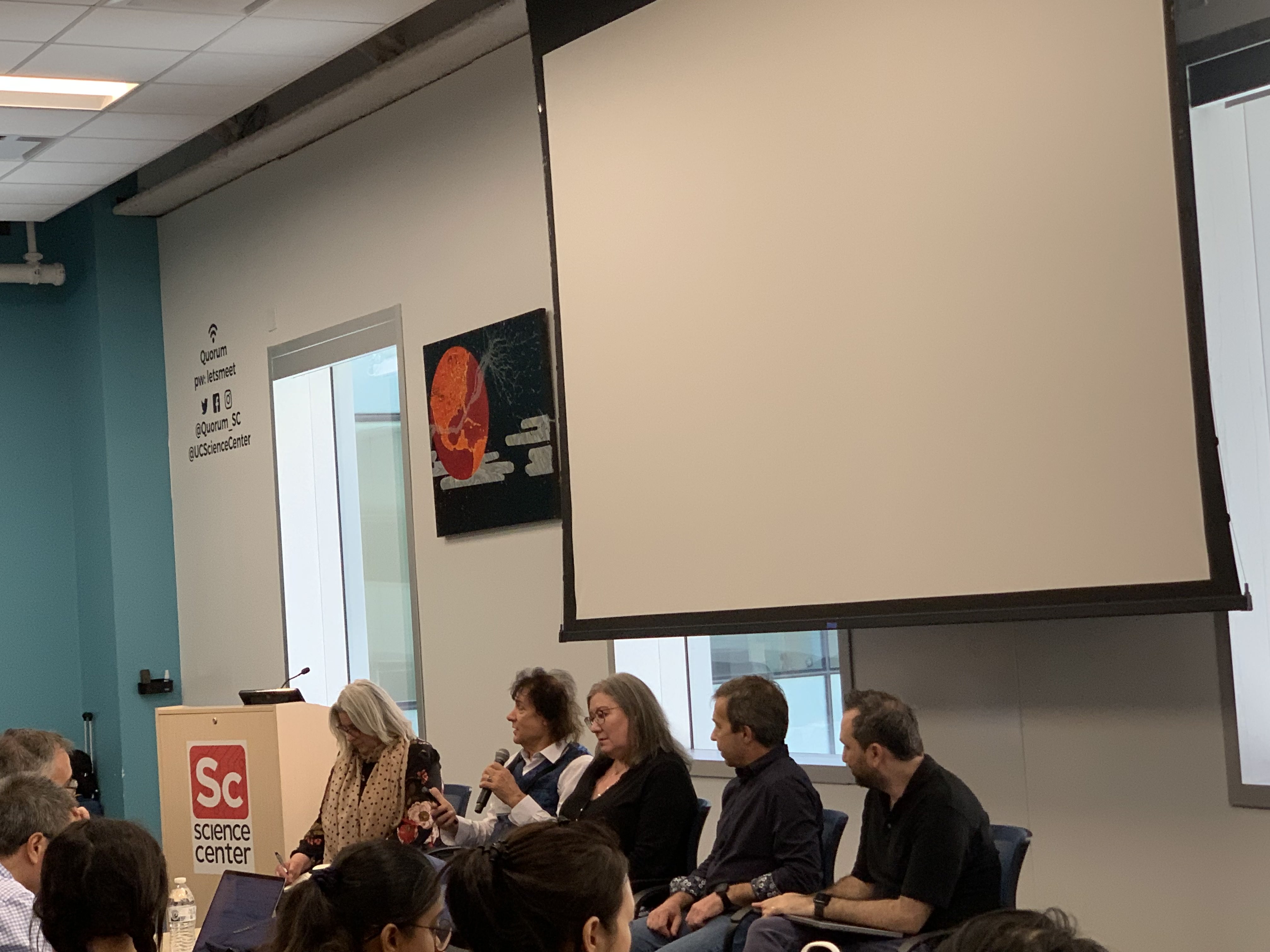 A live panel of experts speaks at the workshop
