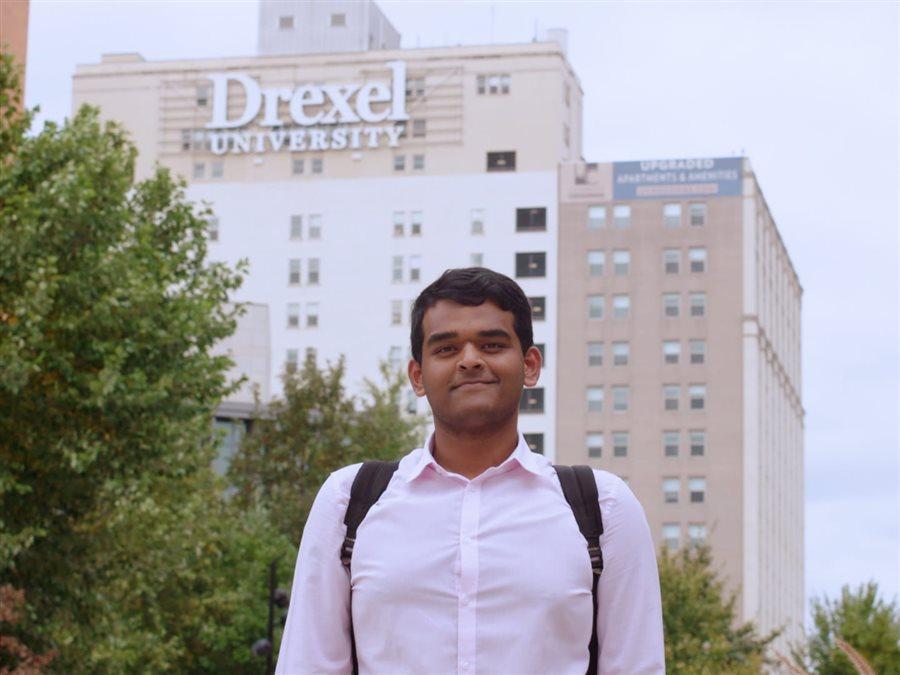 Student standing outside of Drexel campus building