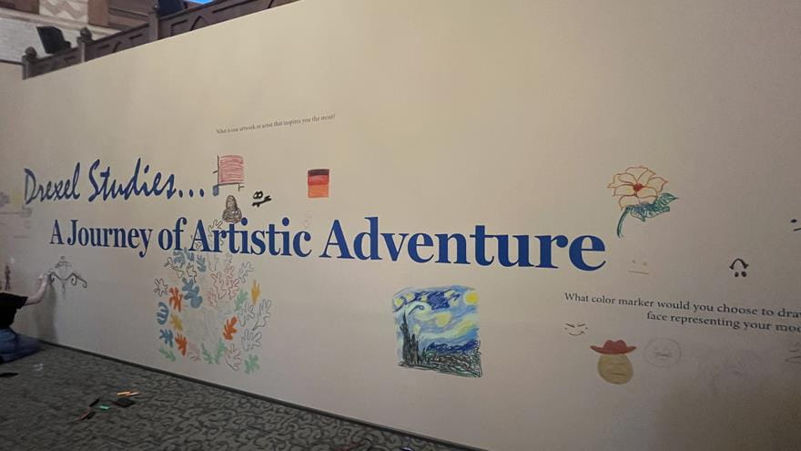 Some of the artworks drawn by visitors at the &quot;Drexel Studies&quot; opening.