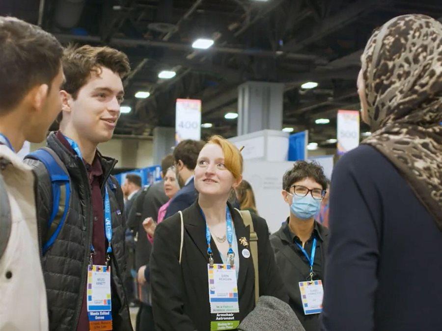 Students talking in a circle at the Walter E. Washington Convention Center in Washington, D.C.