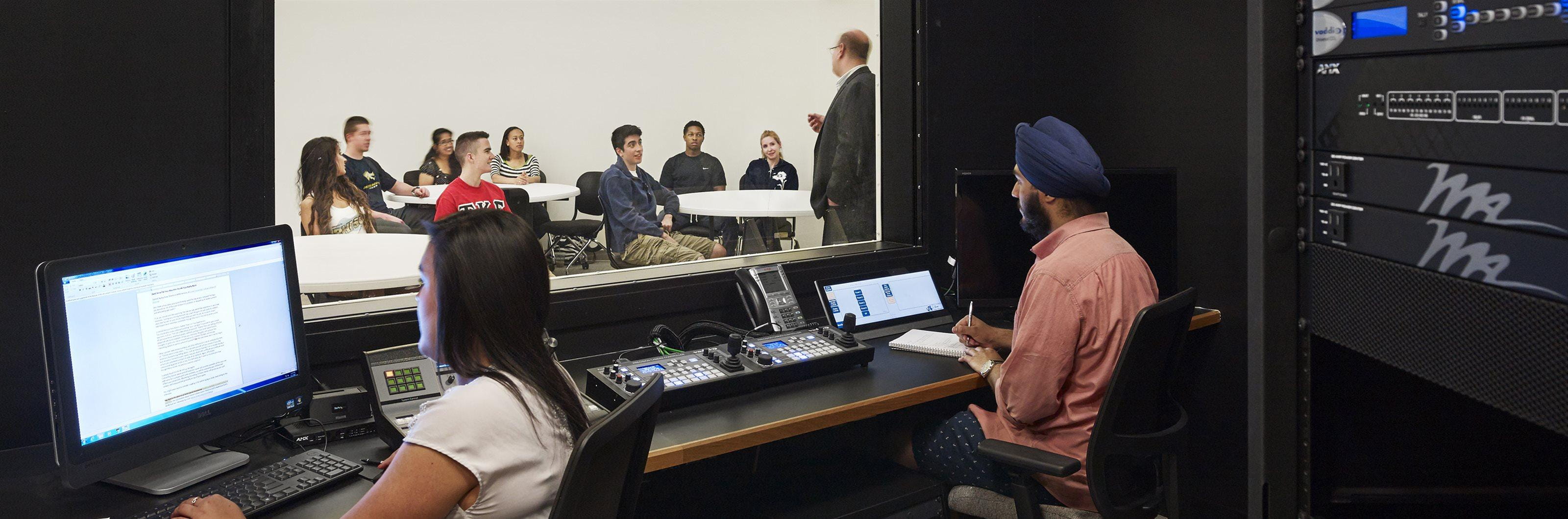 Students observing business interactions