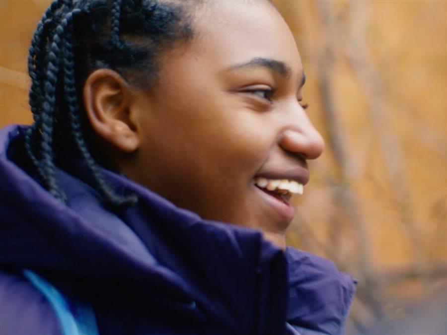 Young person walking outdoors